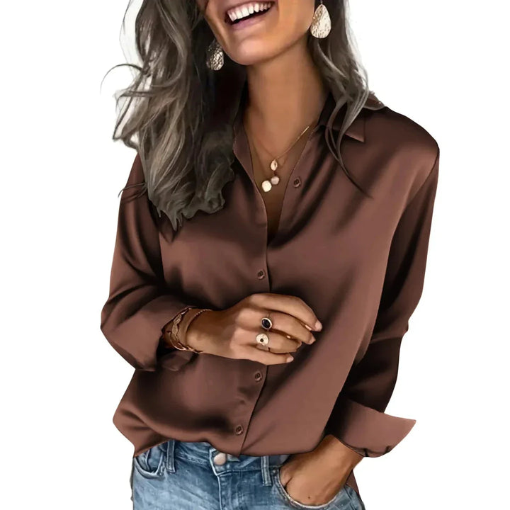 Effortless women's relaxed fit button-down shirt, a comfortable & stylish long-sleeve top.