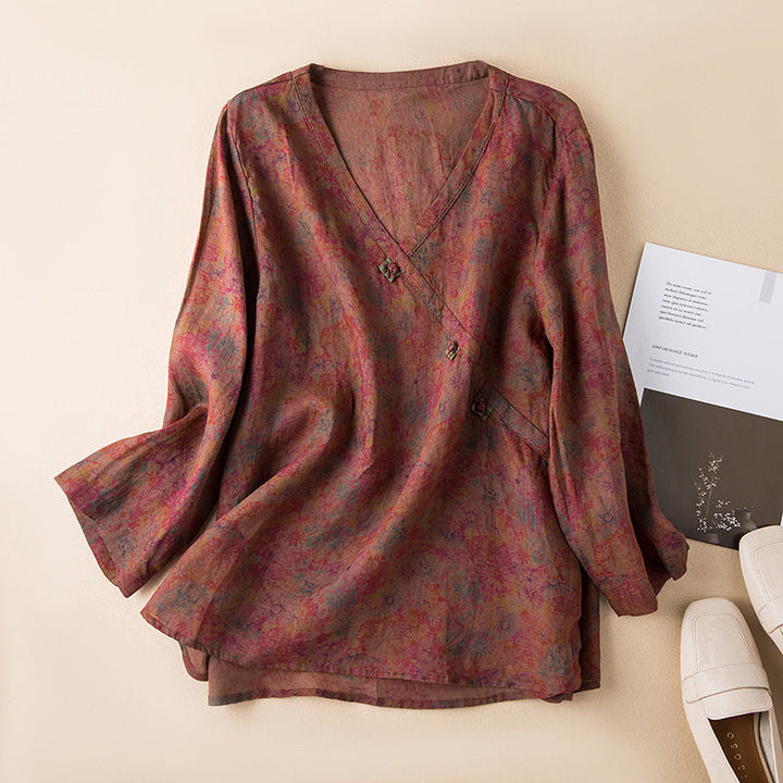 Women's relaxed fit button front blouse, a versatile top for casual elegant spring/summer fashion & work.