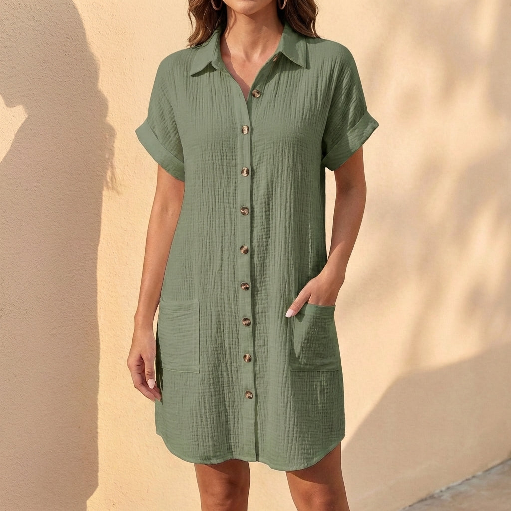 Women's relaxed fit button front midi shirt dress with cuffed sleeves, perfect for casual summer style.