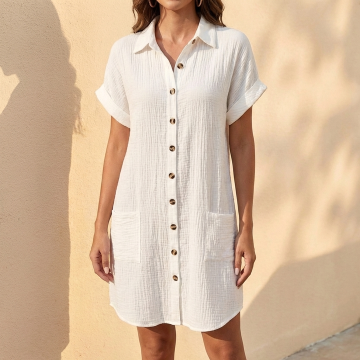 White midi shirt dress for women, relaxed fit, button front, cuffed sleeves. Perfect for summer casual.