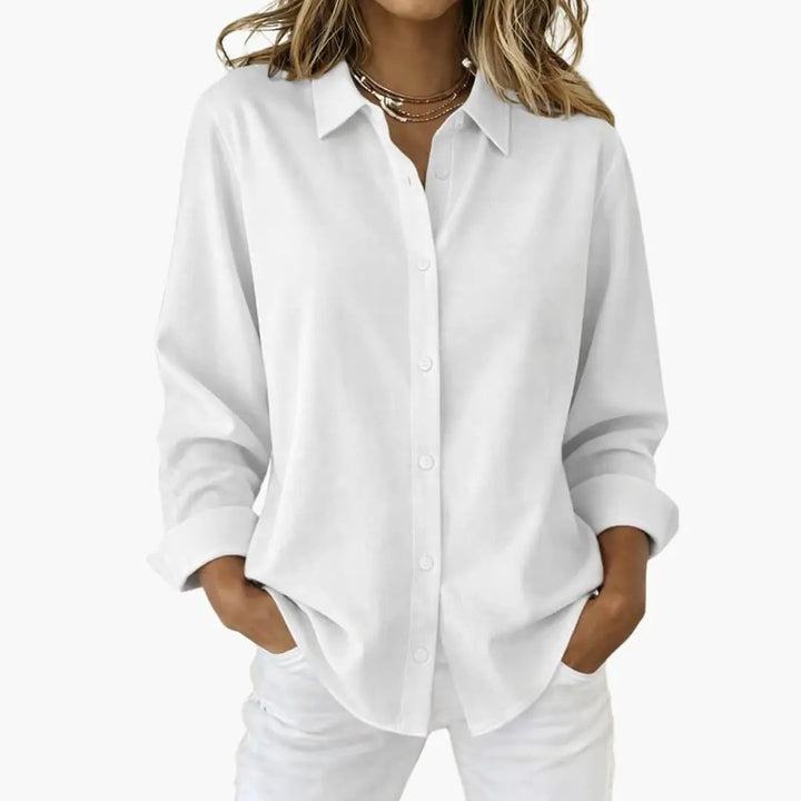 Women's relaxed fit button up long sleeve shirt, perfect for casual or office wear. Timeless style.