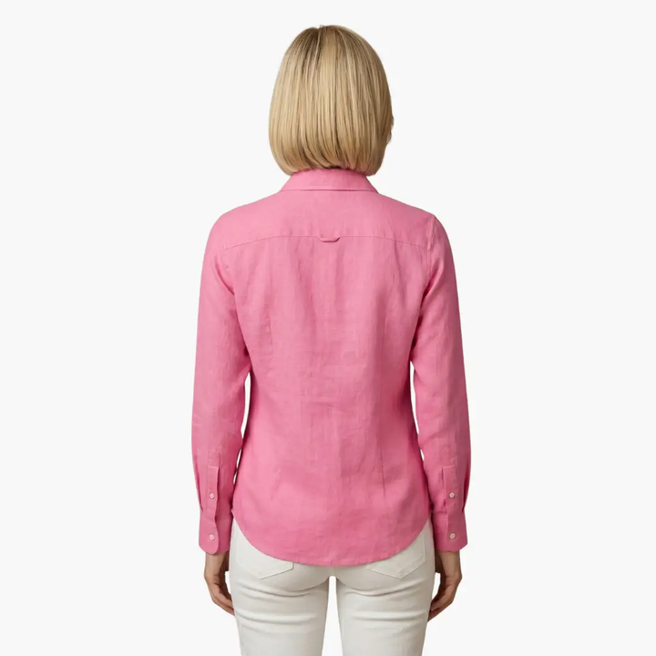 Women's relaxed fit long sleeve button up shirt, styled casually with a comfortable, easygoing look.