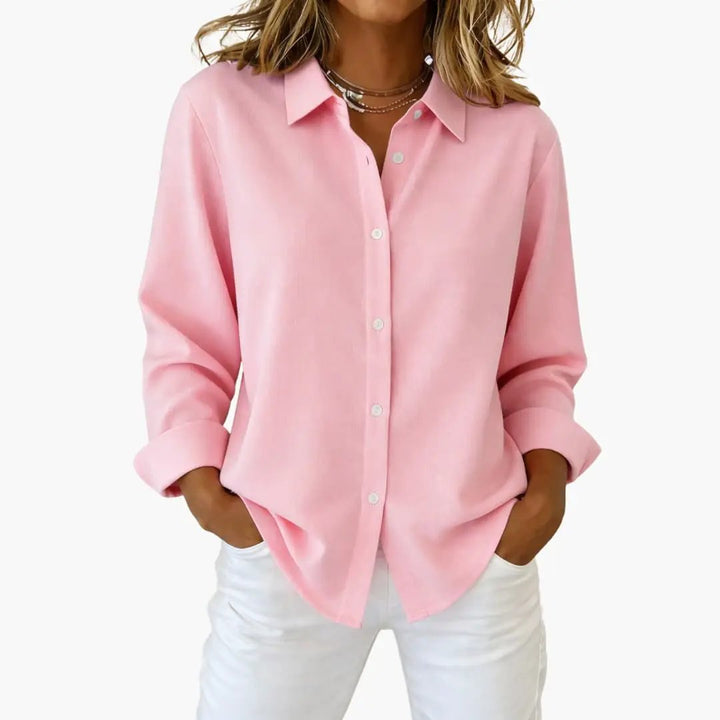 Professional women's button up shirt with long sleeves, relaxed fit, for a polished office ensemble.