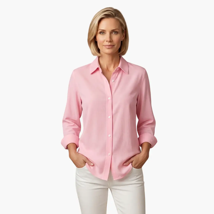 Classic white women's relaxed fit long sleeve button up shirt, an essential, versatile everyday top.