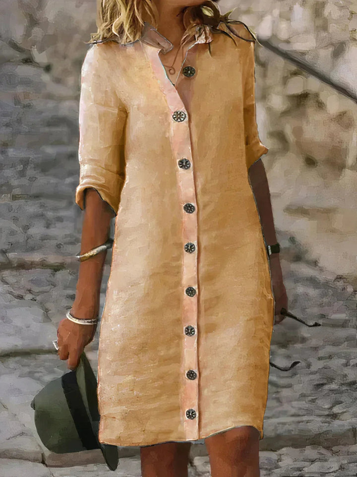 Flowy & comfortable women's midi dress with three-quarter sleeves. Ideal for spring fashion and relaxed casual wear.
