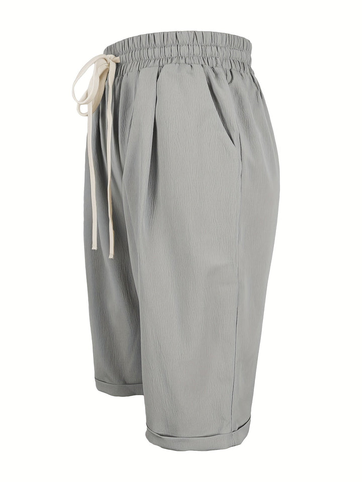 Easy-wear women's elastic waist capri pants, relaxed fit, comfortable pull-on style for summer.