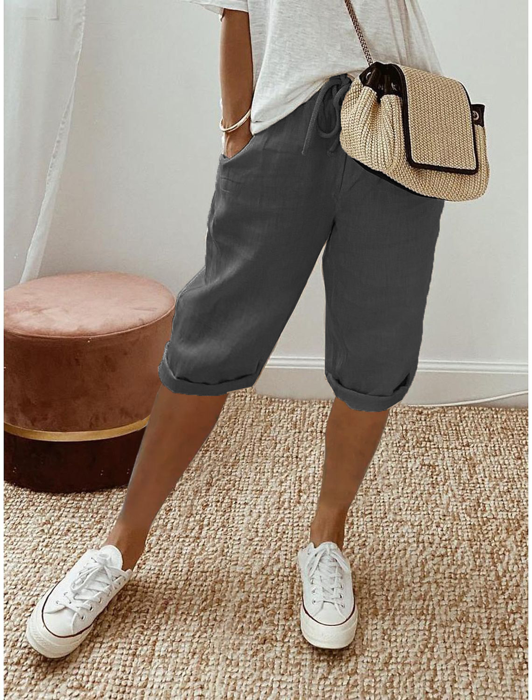 Women's relaxed fit capri trousers with elastic waist, perfect for casual summer adventures.