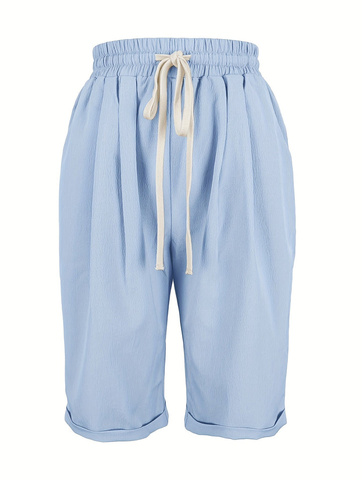 Comfortable women's relaxed fit capri pants with elastic waist for easy pull-on summer style.