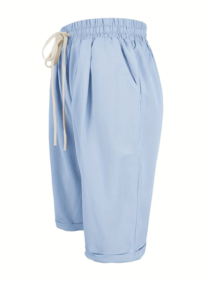 Women's mid-calf capri trousers, relaxed fit, elastic waist, perfect for casual summer outfits.