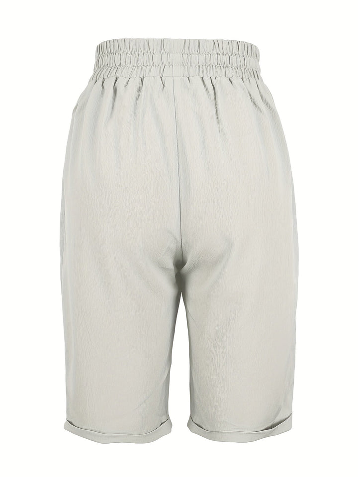 Versatile women's relaxed fit capri pants, elastic waist, comfortable for everyday & summer wear.