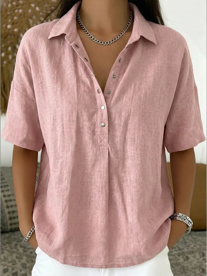 Comfortable women's relaxed fit collar shirt. Stylish short sleeve button-down blouse, ideal for everyday wear.
