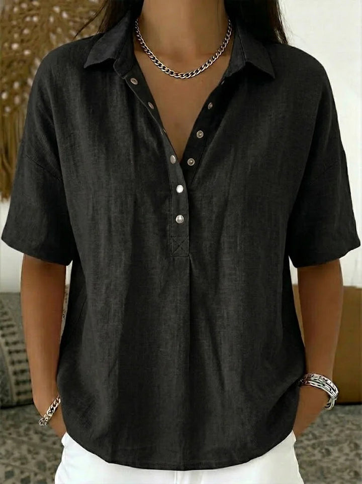 Stylish women's relaxed fit short sleeve collar shirt. Button-down design, perfect for casual or office wear.
