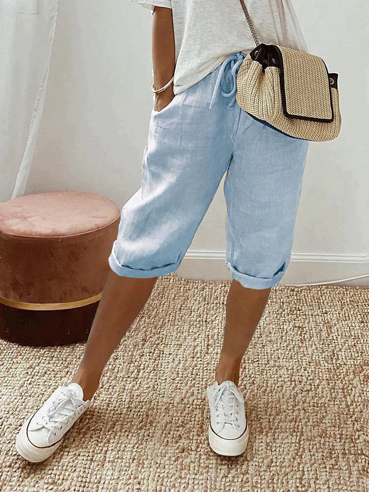 Women's everyday drawstring shorts with a relaxed fit & pockets, essential for comfortable summer outfits.