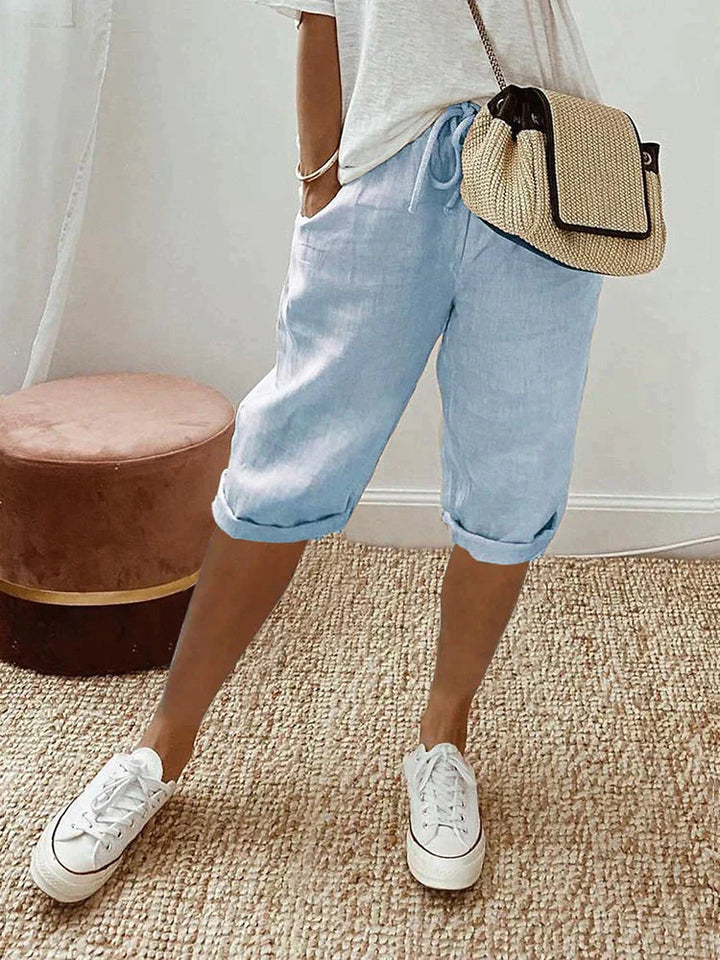 Women's everyday drawstring shorts with a relaxed fit & pockets, essential for comfortable summer outfits.