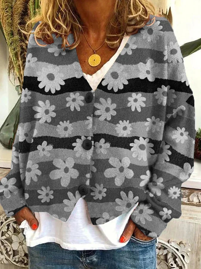 Full view of women's relaxed fit floral stripe button-up cardigan. Chic casual wear, perfect for layering.