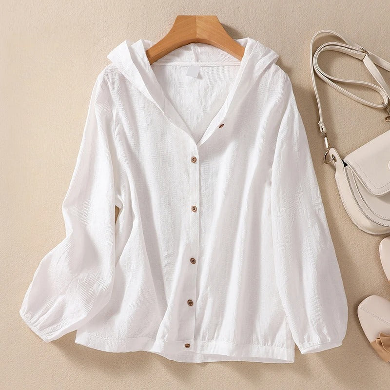 Women's relaxed fit hooded shirt in soft fabric, perfect for casual everyday comfort and effortless style.