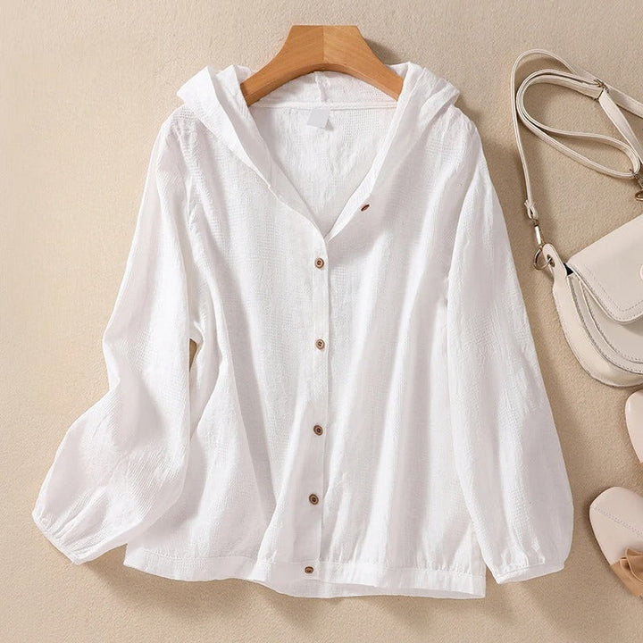 Women's relaxed fit hooded shirt in soft fabric, perfect for casual everyday comfort and effortless style.