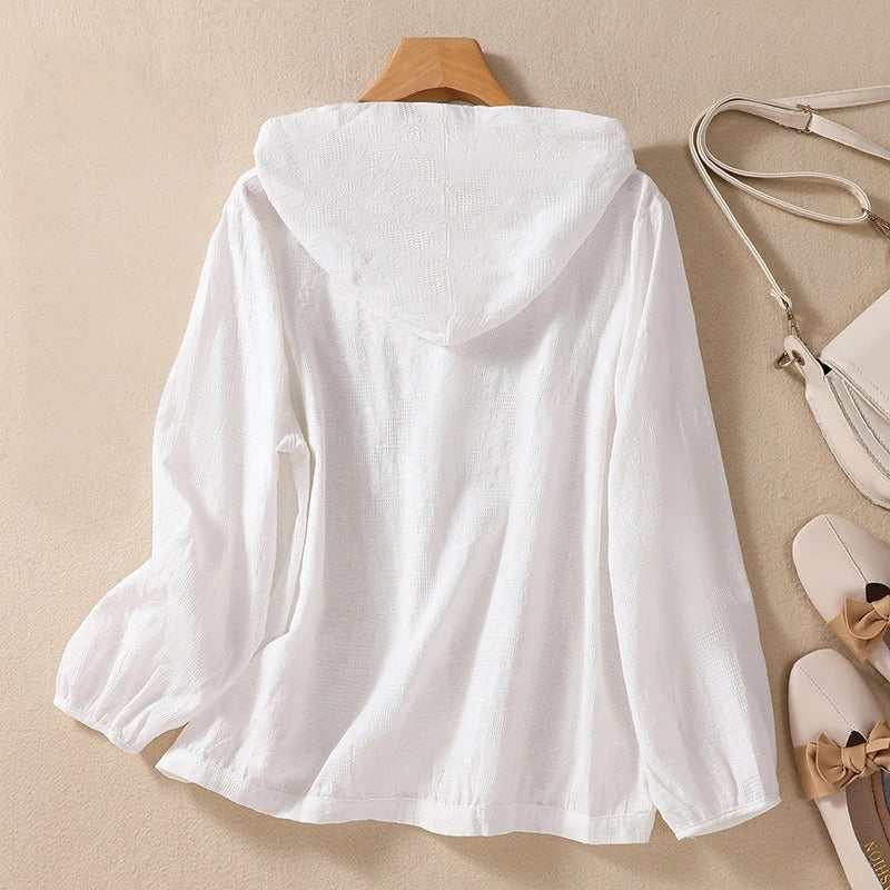 Stylish women's hooded shirt with a relaxed fit, featuring long sleeves for comfortable, casual wear.