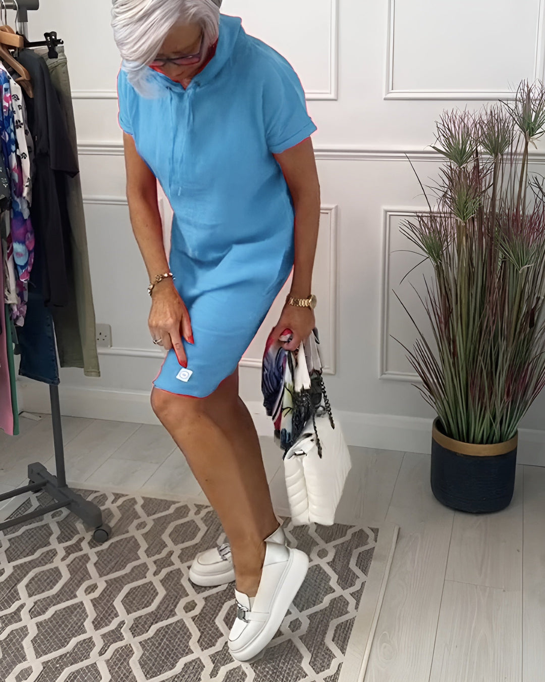 Women's half-sleeve casual midi dress, relaxed fit hoodie style, designed for everyday comfort.