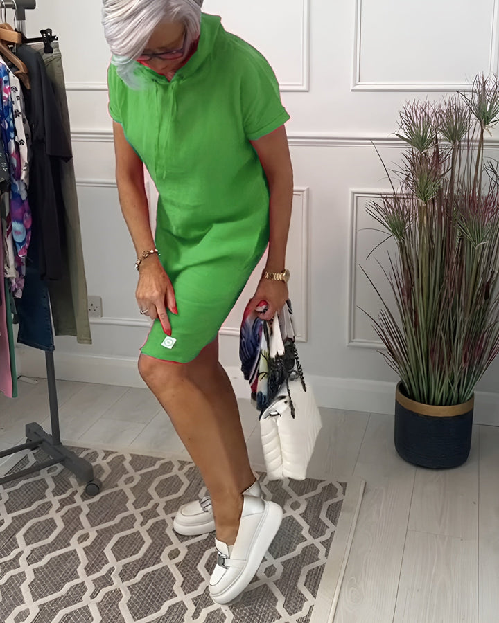 Comfortable women's relaxed fit hoodie midi dress, versatile for spring/summer, with adjustable hood.