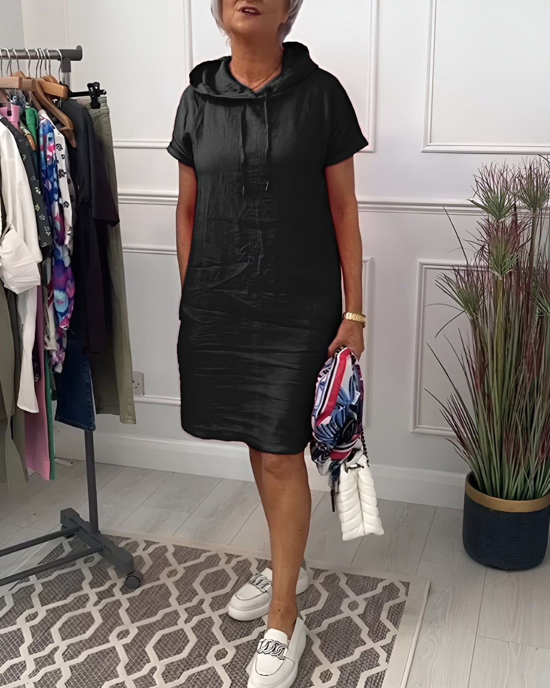 Everyday women's midi dress, a relaxed fit hoodie style with an adjustable hood.