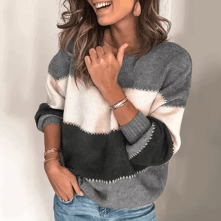 Comfortable women's relaxed fit knit top, long sleeve with ribbed cuffs. Versatile for casual fall fashion.