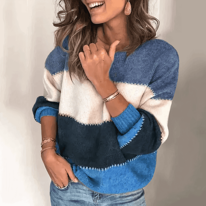 Soft women's relaxed fit knit sweater, long sleeve. Crew neck, ribbed cuffs. Essential fall & winter clothing.