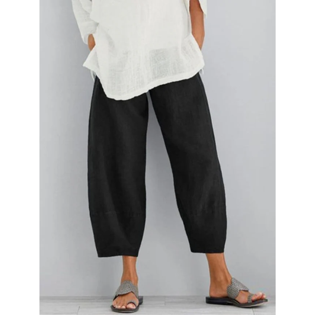 Black women's relaxed fit pull-on pants. Comfortable and casual leisure wear, perfect for everyday style.