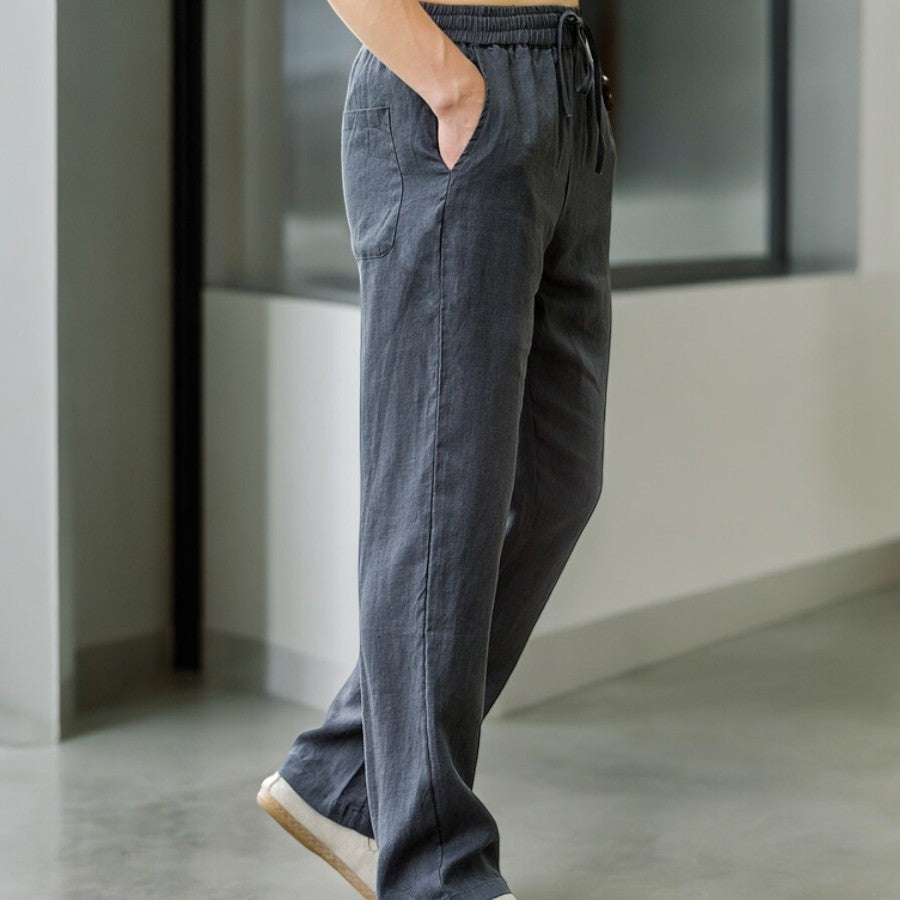 Detail of the elastic waistband and drawstring on women's relaxed fit linen pants for comfort