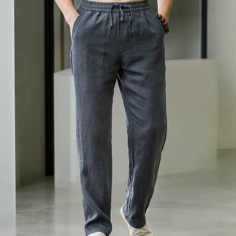 Back view of women's relaxed fit linen pants, showing a simple, elegant cut and breathable material