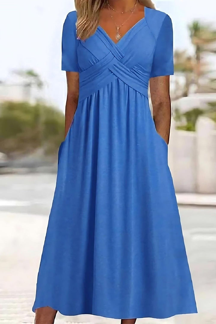 Women's relaxed fit midi dress with a stylish print, perfect for casual summer wear and effortless everyday style.