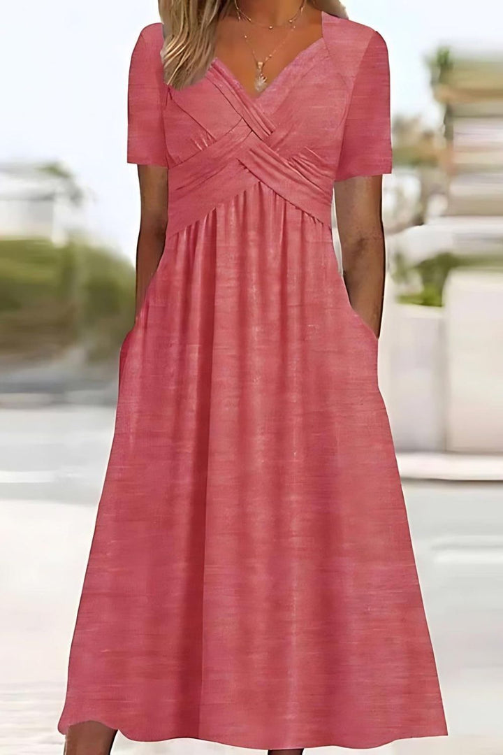 Modest women's printed midi dress, featuring a relaxed fit for comfortable and stylish spring/summer fashion.