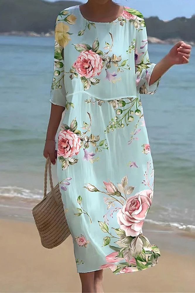 Women's relaxed fit midi dress with a vibrant print, perfect for casual spring and summer comfort.