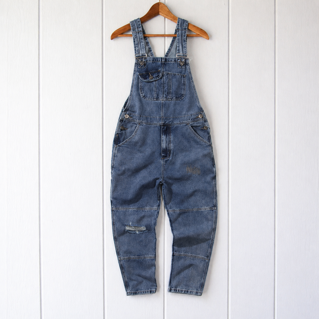 Close-up of women's relaxed fit overalls showing practical utility pockets. Ideal for casual spring & fall fashion.
