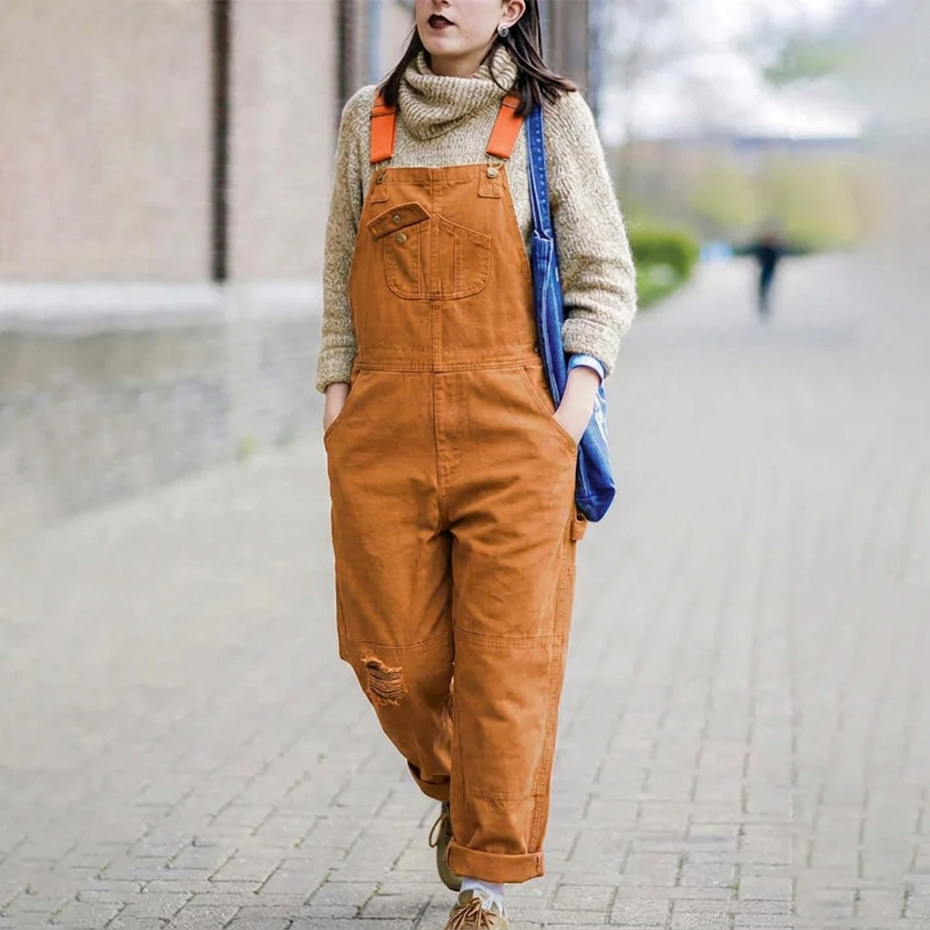 Back view of women's relaxed fit overalls, emphasizing the comfortable, loose silhouette for fall & spring fashion.