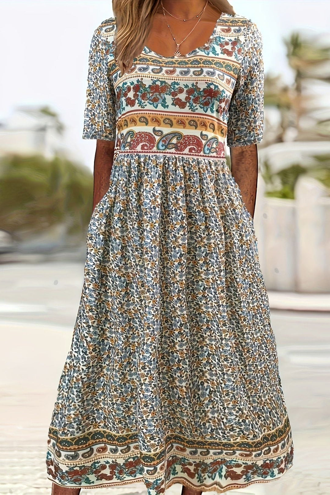 Women's relaxed fit printed midi dress, casual & comfortable for everyday summer fashion. Effortless style.