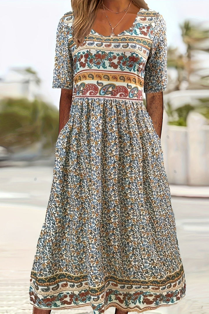 Women's relaxed fit printed midi dress, casual & comfortable for everyday summer fashion. Effortless style.