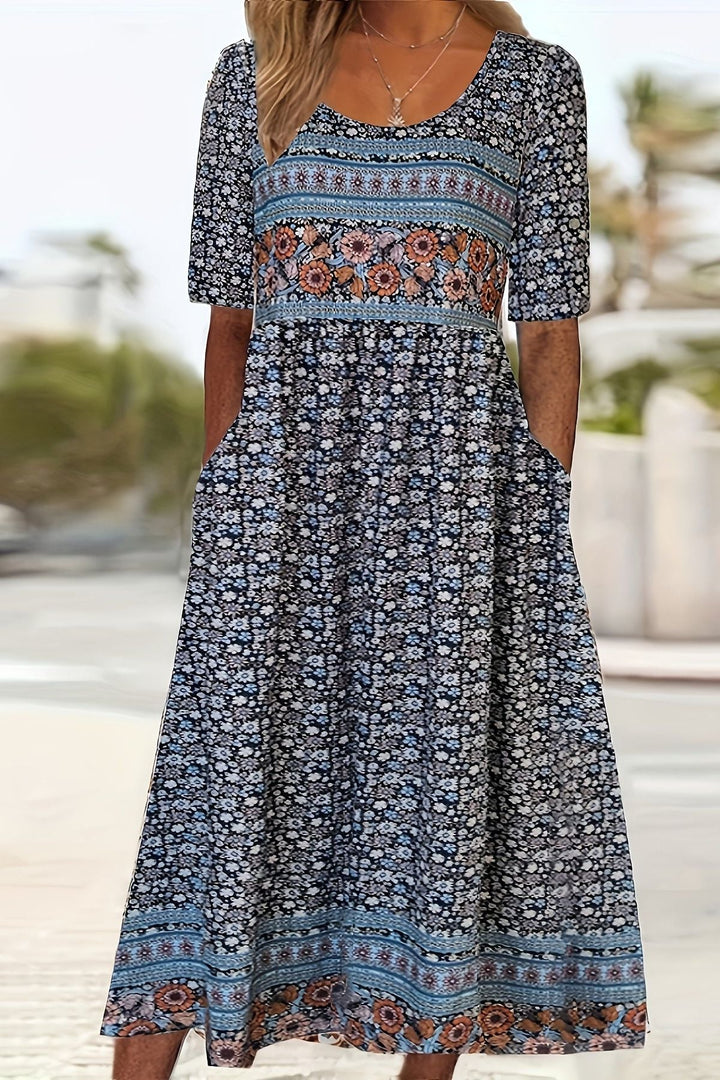 Comfortable women's printed midi dress, perfect for summer. Relaxed fit, stylish and versatile everyday wear.