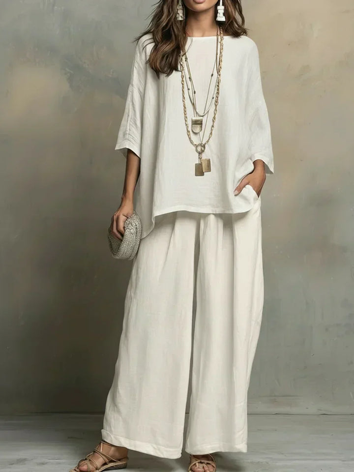 Women's relaxed fit shirt & wide leg pants set. Comfortable two-piece outfit for casual wear.