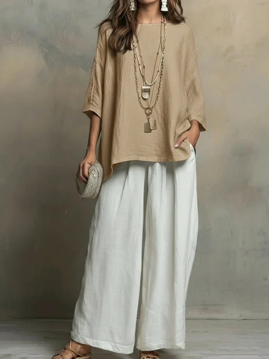 Chic women's matching set, perfect for summer fashion & vacation wear. Relaxed fit shirt & pants.