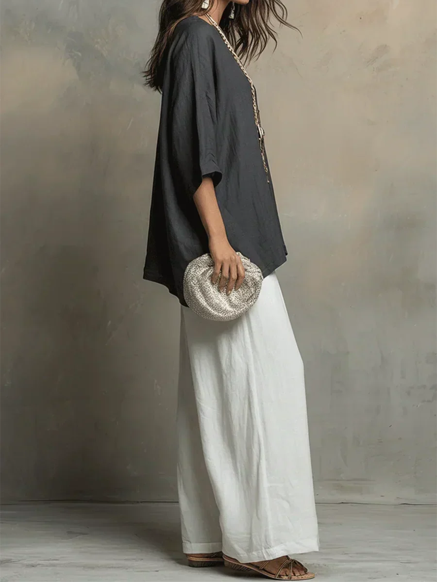 Elegant women's relaxed fit matching set. Stylish wide leg pants & top for a chic everyday look.