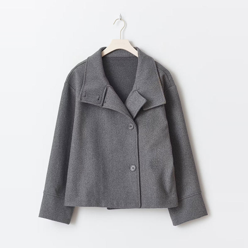 Comfortable women's relaxed fit short coat, perfect for fall fashion. Features a cozy high neck & sleek button closure.