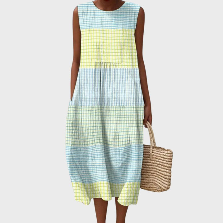 Women's relaxed fit sleeveless casual dress, knee-length, perfect for summer daily wear.