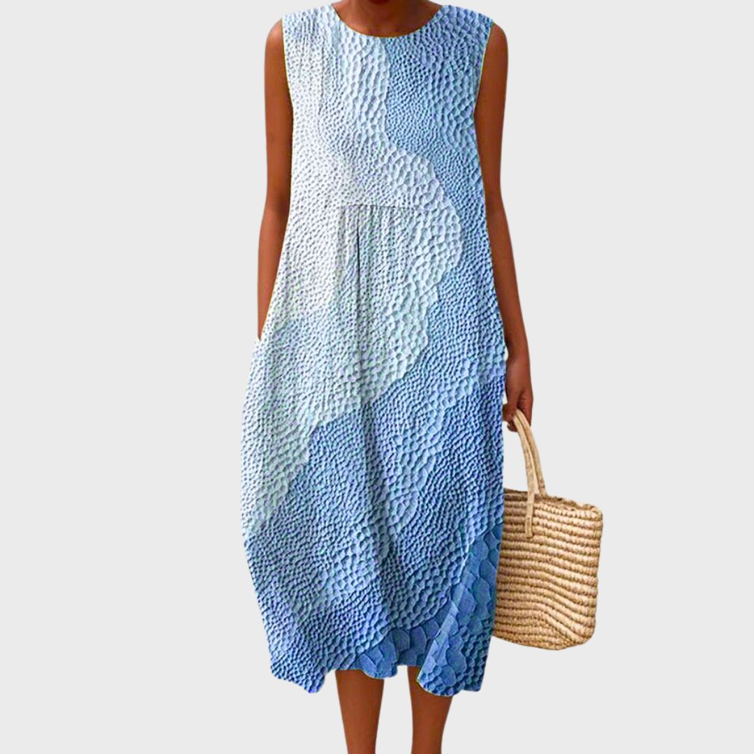 Flowy women's summer relaxed fit sleeveless dress, knee-length, ideal for casual daily wear.