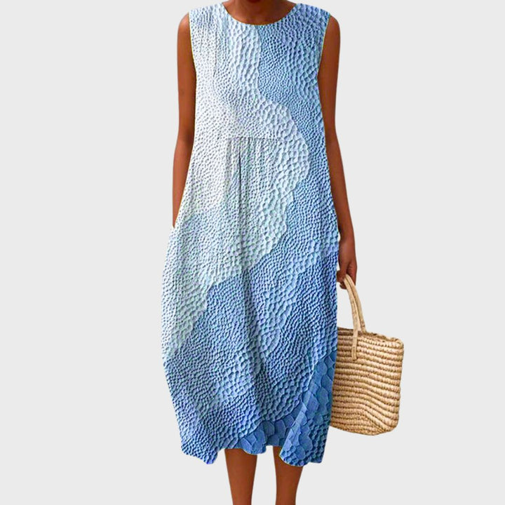 Flowy women's summer relaxed fit sleeveless dress, knee-length, ideal for casual daily wear.