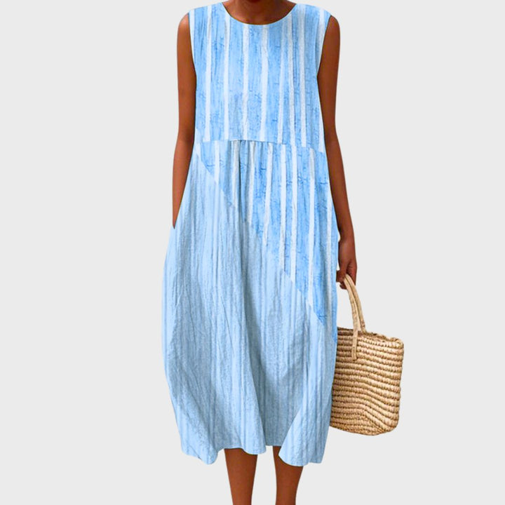 Versatile women's plus size relaxed fit sleeveless casual dress, knee-length for comfort.