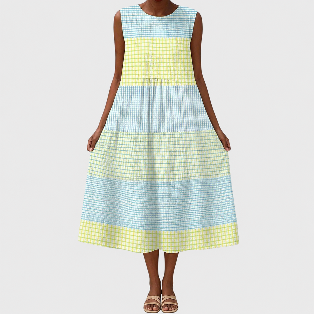 Woman wearing a comfortable relaxed fit sleeveless casual dress, knee-length, ideal for daily activities.