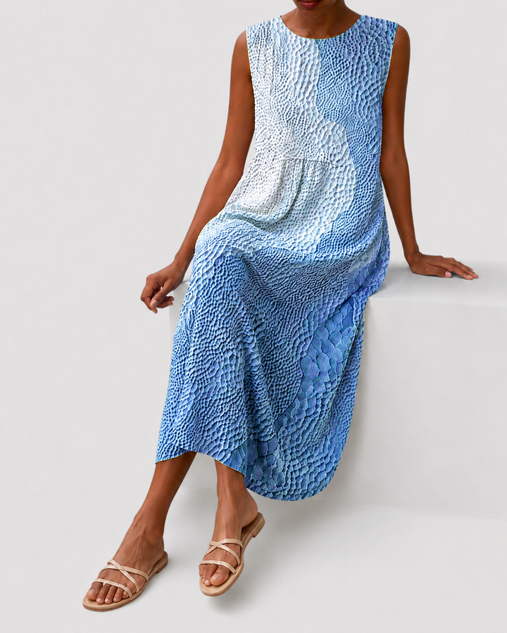 Soft, flowy women's sleeveless knee-length casual dress, relaxed fit for ultimate comfort.