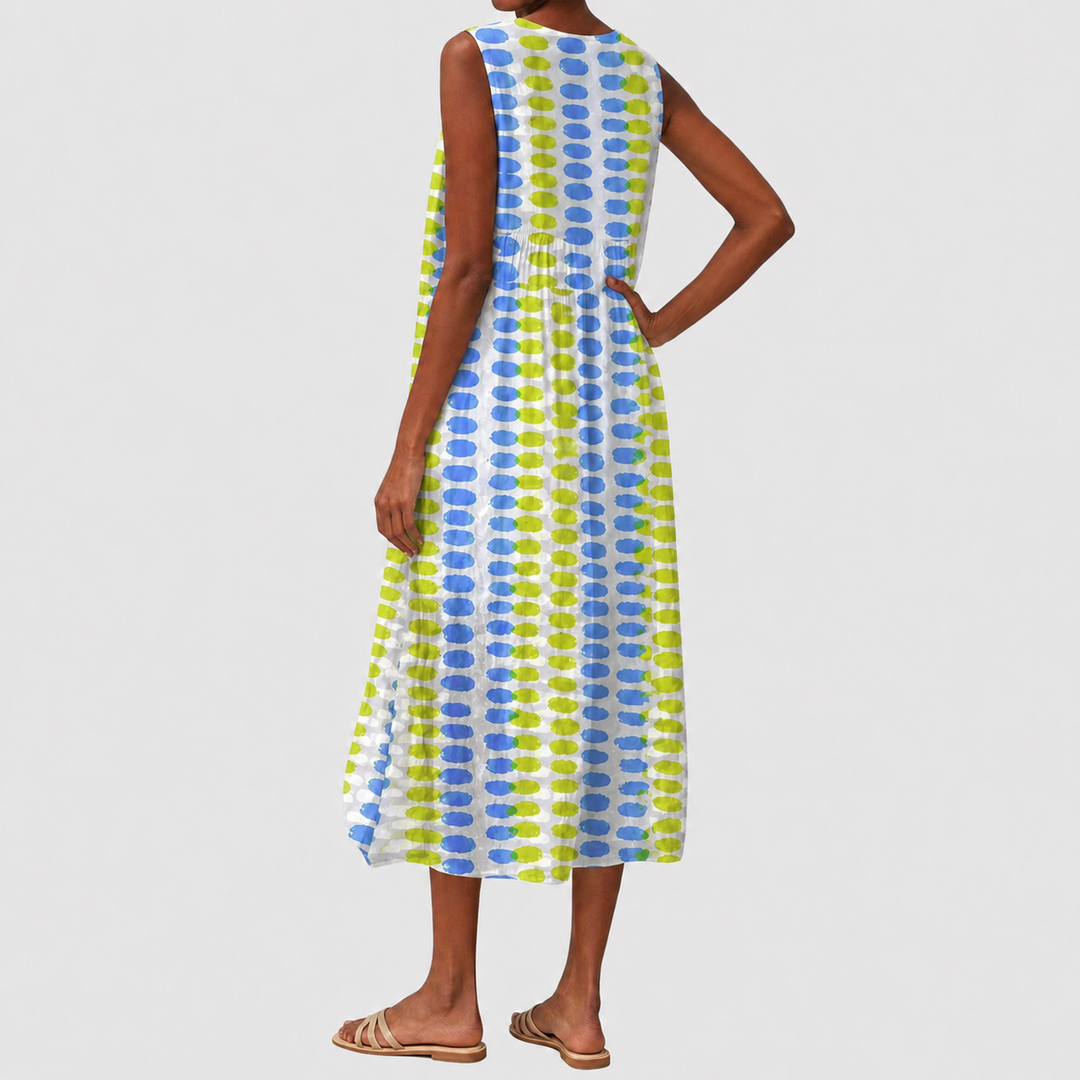 Side view of a comfortable women's sleeveless knee-length casual dress, relaxed fit with pockets.