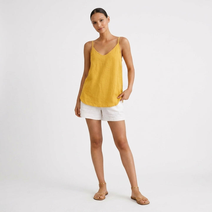 Stylish women's relaxed fit spaghetti strap tank top, perfect for a chic summer look.